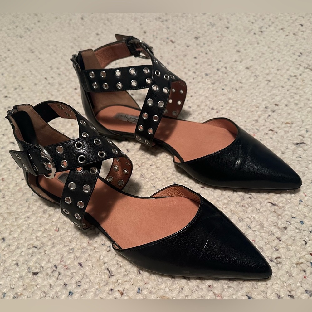 Black Halogen Pointed Toe Flat with Metal Details.